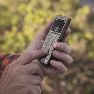 Мобільний телефон Panasonic KX-TU160 Grey KX-TU160EXG фото