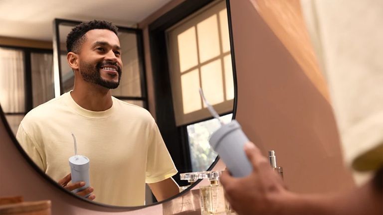 Зубна електрощітка PHILIPS Насадки для іригатора Sonicare HX3072/00 Compact Flosser 1000 HX3072/00 фото